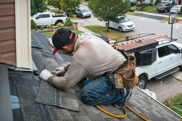 Professional Roofing technician working in East Moline, IL